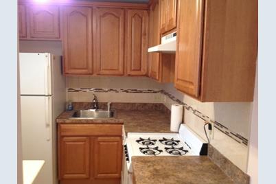 4925 Washington St #105, Boston, MA 02132 - Photo 1