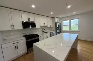 94 Tennis Plaza Rd, Dracut, MA 01826 - Photo 1