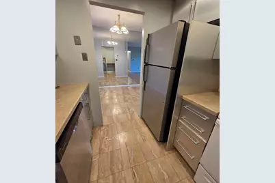 50-56 Broadlawn Park #410, Boston, MA 02467 - Photo 1