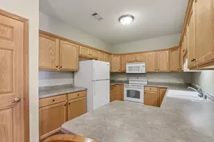 1275 Shadowood Cir, West Bend, WI 53095 - Photo 7