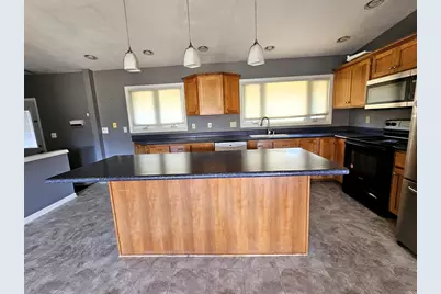 7710 N Edgeworth Dr, Milwaukee, WI 53223 - Photo 9