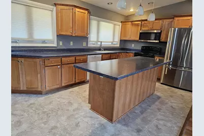 7710 N Edgeworth Dr, Milwaukee, WI 53223 - Photo 11