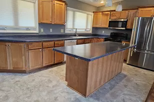 7710 N Edgeworth Dr, Milwaukee, WI 53223 - Photo 11