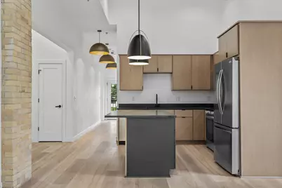 308  Oak St #202, Slinger, WI 53086 - Photo 1