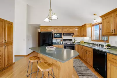 1001  Spring Waters Dr, Oconomowoc, WI 53066 - Photo 11