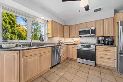 9060 N Meadowlark Ln, Bayside, WI 53217 - Photo 17