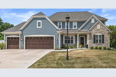 W273N2473  Arlington Dr, Pewaukee, WI 53072 - Photo 1