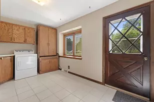 12655 N River Forest Cir, Mequon, WI 53092 - Photo 23