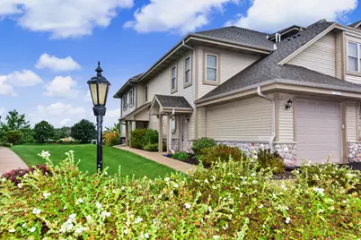 W173N5537  Ravenwood Dr #5537, Menomonee Falls, WI 53051 - Photo 1