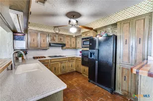 10745 Rosemar Ln, Adkins, TX 78101 - Photo 13