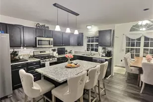 9691 Emerald Brook Cir NW, Canal Fulton, OH 44614 - Photo 5