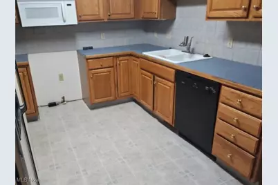 1469 Cove Street NW, Uniontown, OH 44685 - Photo 3