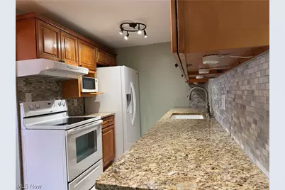 9611 Sunrise Boulevard #K-9, North Royalton, OH 44133 - Photo 13