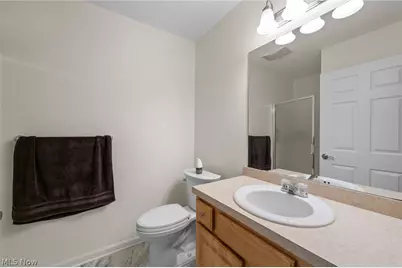 140 Woodbury Glen Street, Hartville, OH 44632 - Photo 21