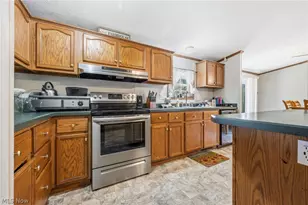 7022 Bluebird Rd NW, East Canton, OH 44730 - Photo 13