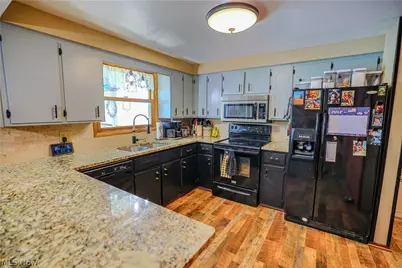 5244 Oakridge Drive, Louisville, OH 44641 - Photo 31
