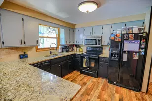 5244 Oakridge Dr, Louisville, OH 44641 - Photo 31