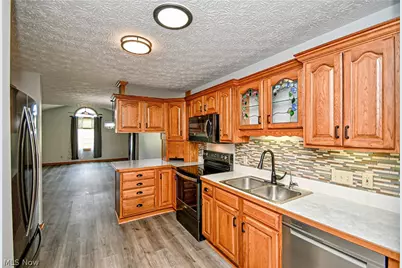 12782 Forsythia Avenue NW, Uniontown, OH 44685 - Photo 7
