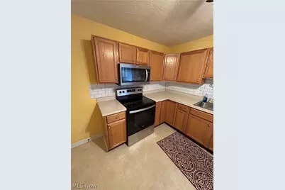 1313 Wynridge Avenue, Louisville, OH 44641 - Photo 13