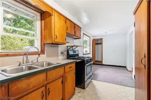 277 Devinney Ave, Louisville, OH 44641 - Photo 5