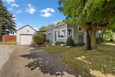 6079 Eastlawn Street NE, Louisville, OH 44641 - Photo 1