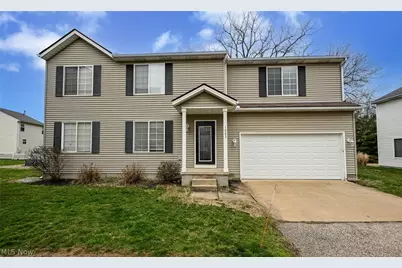 1083 Reeves Court, Lakemore, OH 44312 - Photo 1