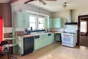 411 S Santa Fe St, Wolfe City, TX 75496 - Photo 7