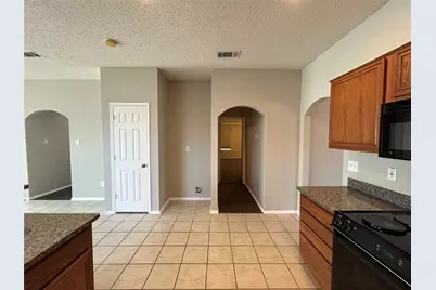 9012 Rushing River Drive, Fort Worth, TX 76118 - Photo 7