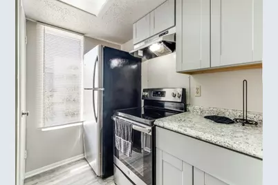 7431 Holly Hill Drive #210, Dallas, TX 75231 - Photo 13