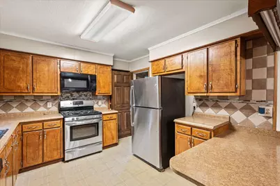 706 S Santa Fe Street, Wolfe City, TX 75496 - Photo 11