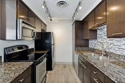 6211 W Northwest Highway #1004, Dallas, TX 75225 - Photo 9
