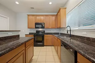 9939 Wethers Field Cir, Providence Village, TX 76227 - Photo 11