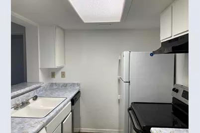7431 Holly Hill Drive #115, Dallas, TX 75231 - Photo 9