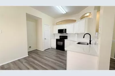 9021 Rushing River Drive, Fort Worth, TX 76118 - Photo 7