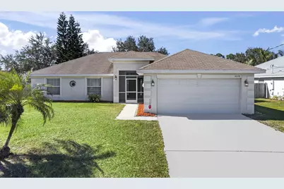 4058 SW Canrady Street, Port Saint Lucie, FL 34953 - Photo 1