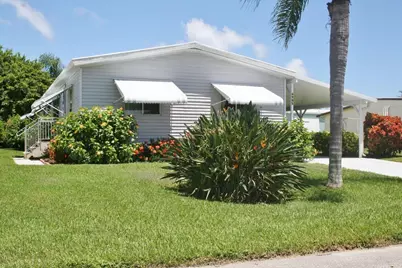 6985 SE Amendment Street, Hobe Sound, FL 33455 - Photo 1