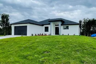 2561 25th St W, Lehigh Acres, FL 33971 - Photo 1