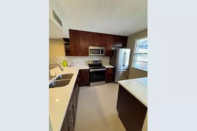 3521 Village Boulevard #103, West Palm Beach, FL 33409 - Photo 1