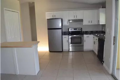 702 SW Arkansas Terrace, Port Saint Lucie, FL 34953 - Photo 3
