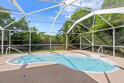1042 SW Janette Avenue, Port Saint Lucie, FL 34953 - Photo 1