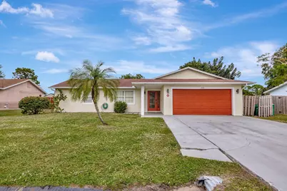 1541 SE Minorca Avenue, Port Saint Lucie, FL 34952 - Photo 1