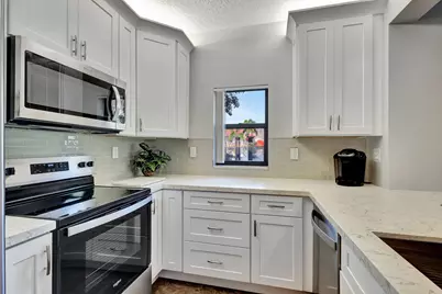 300 Uno Lago Drive, Unit #101, Juno Beach, FL 33408 - Photo 11