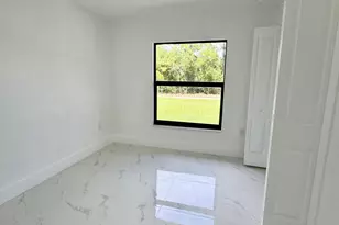 668 Chemstrand St E, Lehigh Acres, FL 33974 - Photo 25