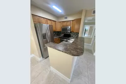 7233 Golf Colony Court E #102, Lake Worth, FL 33467 - Photo 11