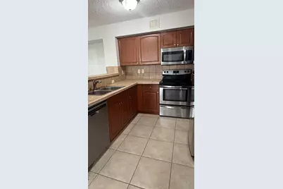 1755 Village Boulevard, Unit #105, West Palm Beach, FL 33409 - Photo 5