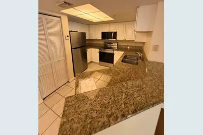 1100 Crestwood Court S, Unit #1104, Royal Palm Beach, FL 33411 - Photo 1