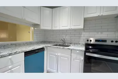 12009 Poinciana Boulevard, Unit #202, Royal Palm Beach, FL 33411 - Photo 1