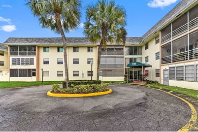 5190 E Sabal Palm Boulevard, Unit #104, Tamarac, FL 33319 - Photo 1