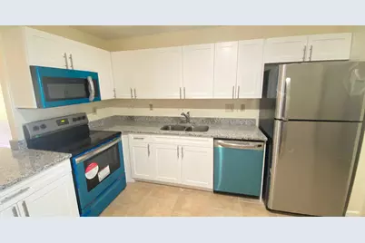 5935 Forest Hill Boulevard, Unit #8, West Palm Beach, FL 33415 - Photo 1