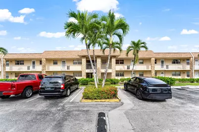 9911 Sandalfoot Boulevard #113, Boca Raton, FL 33428 - Photo 1